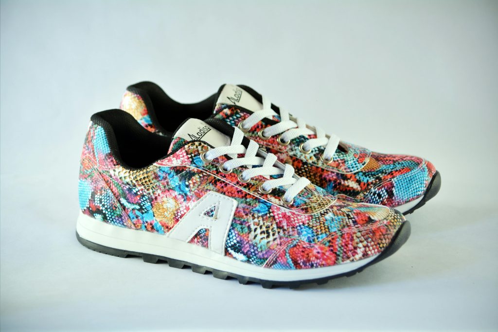 Eye-catching colorful sneakers with vibrant patterns, perfect for casual wear.